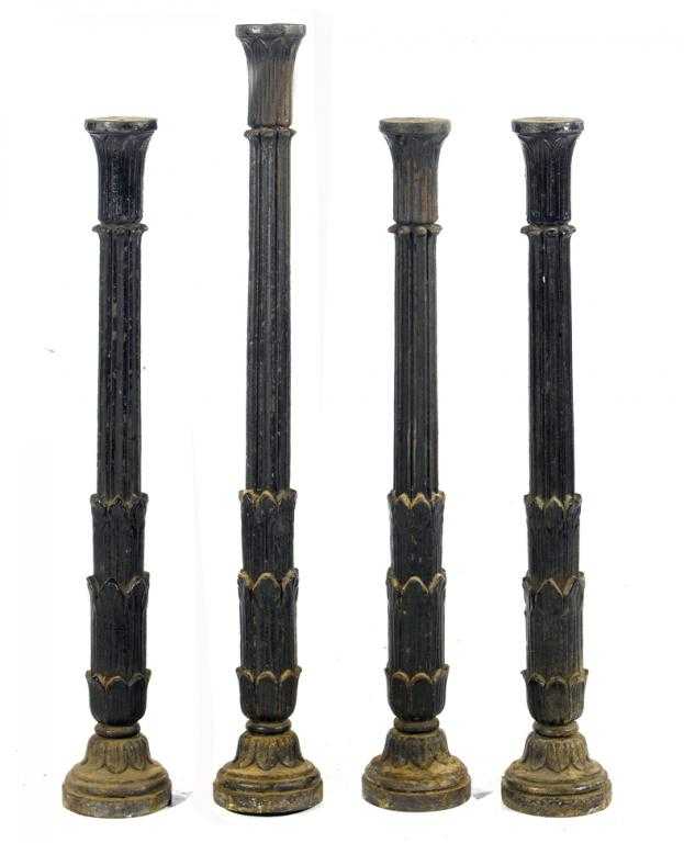 Appraisal: FOUR VICTORIAN CAST IRON LAMP POSTS the fluted tapering shaft