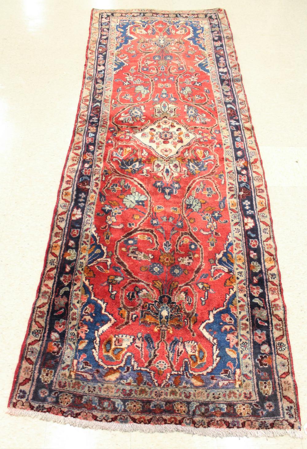 Appraisal: SEMI-ANTIQUE PERSIAN HALL RUG Hamadan region northwestern Iran floral and