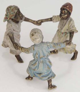 Appraisal: Painted Metal Figure of Three Children painted figure of three