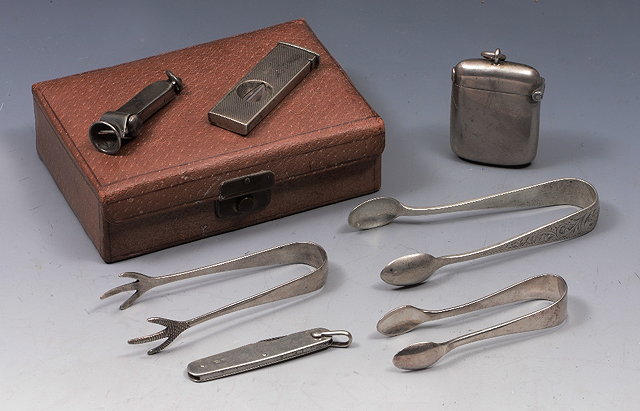 Appraisal: A COLLECTION TO INCLUDE two silver cigar cutters one stamped