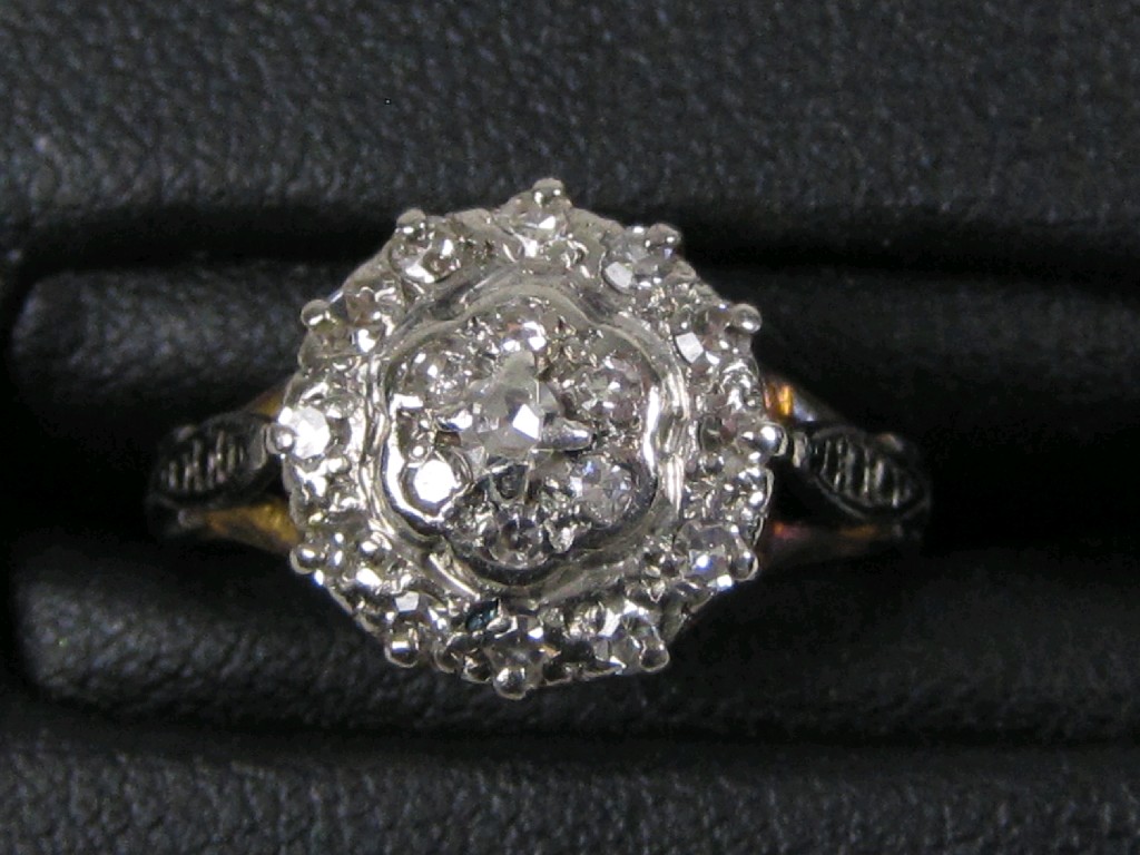 Appraisal: A Diamond cluster Ring pav -set nineteen circular-cut stones in