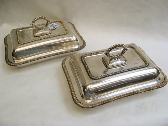 Appraisal: PAIR SHEFFIELD PLATE COVERED SERVING DISHES The rectangular silver plated