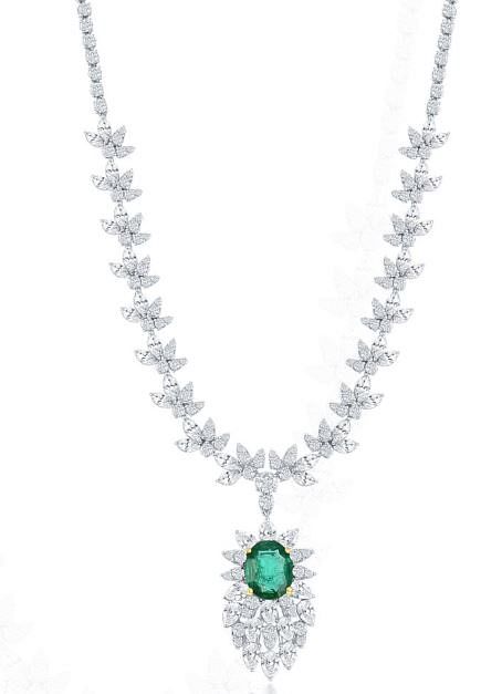 Appraisal: K GOLD EMERALD AND DIAMOND NECKLACE Beautiful lace-like diamond detail