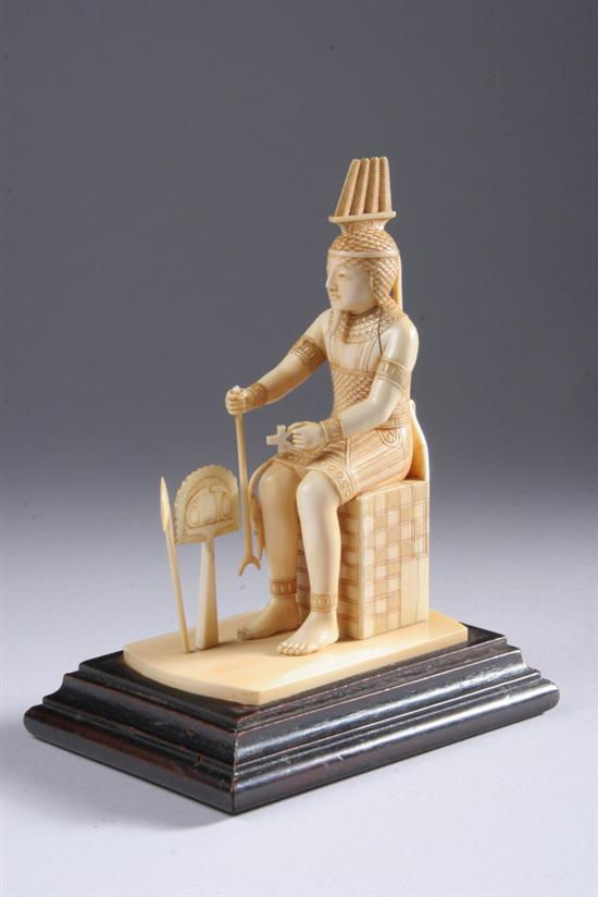 Appraisal: EGYPTIAN REVIVAL IVORY FIGURE OF MAN Seated holding staff -