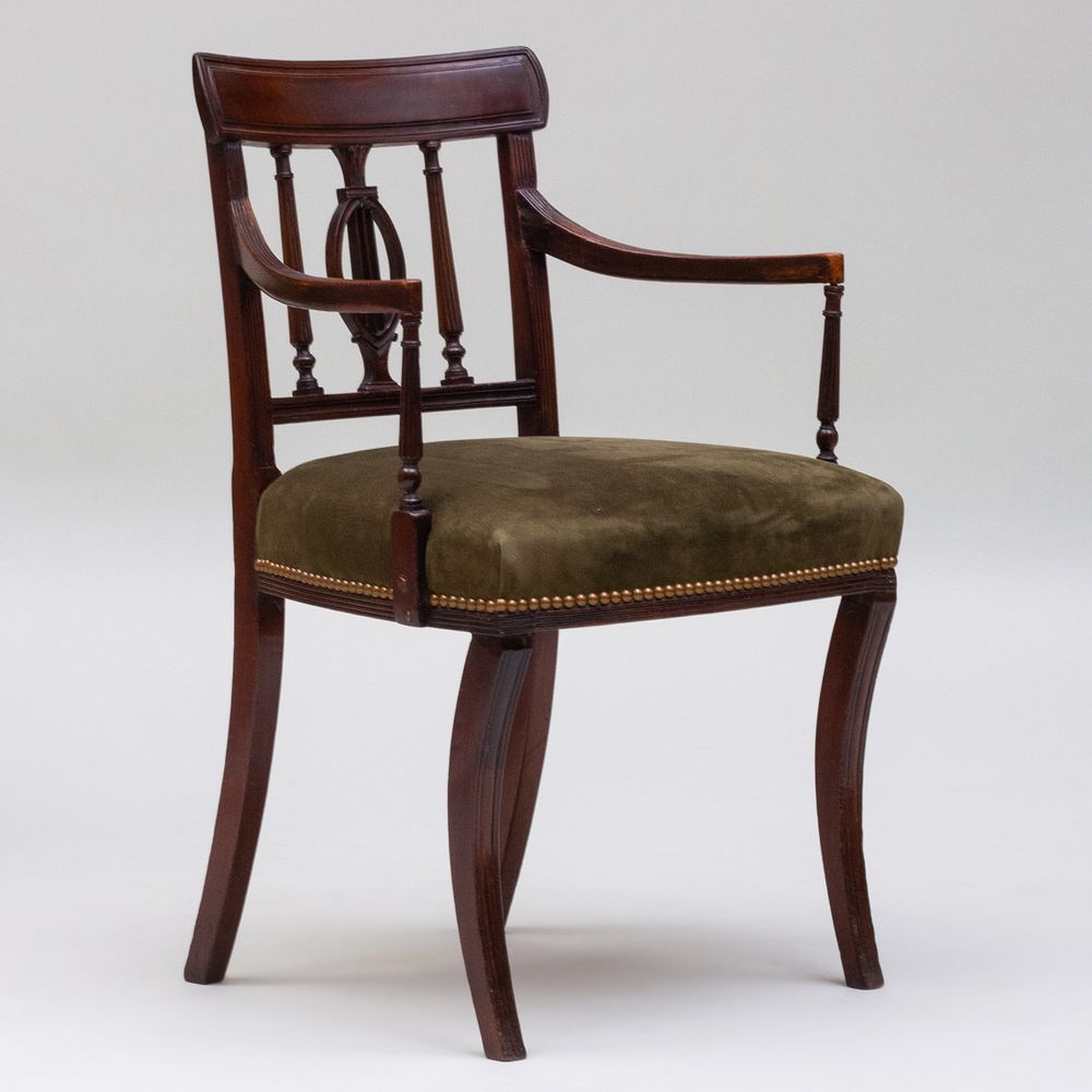 Appraisal: Late George III Carved Mahogany Armchair With a suede upholstered