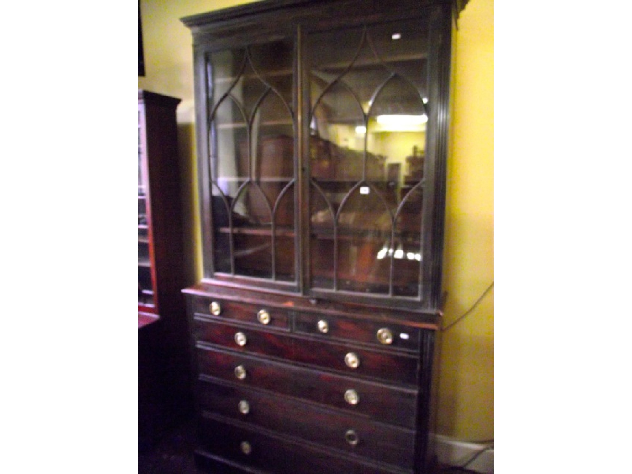 Appraisal: A substantial Regency mahogany secretaire bookcase the lower section presented