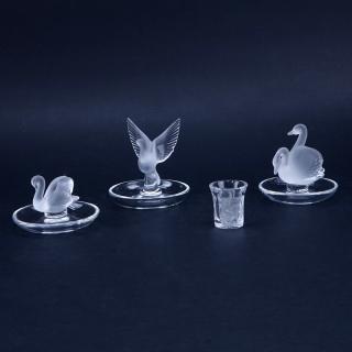 Appraisal: Collection of Four Lalique Crystal Tableware Includes Cynge swan pin