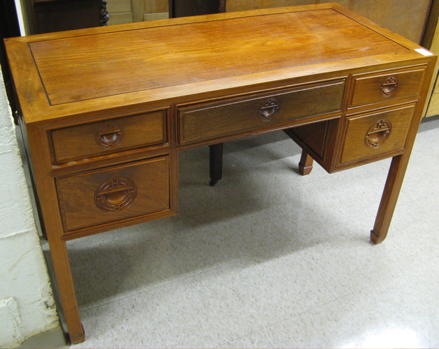 Appraisal: CHINESE TEAKWOOD WRITING DESK having a flat rectangular panel top