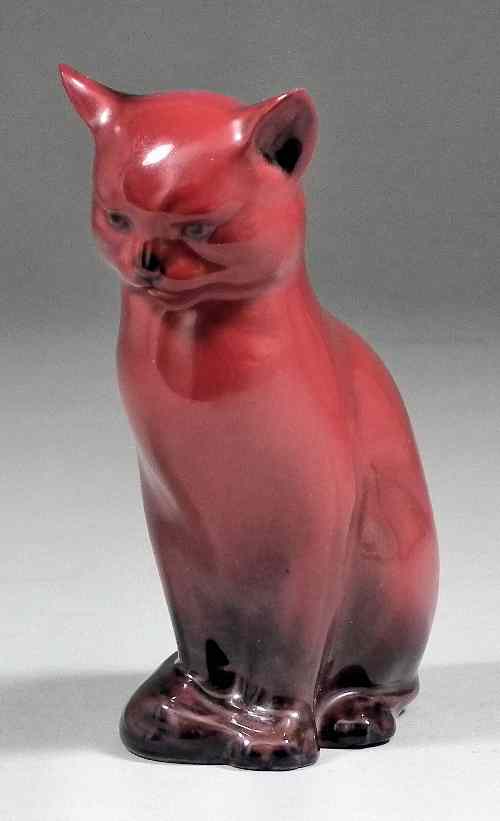 Appraisal: A Royal Doulton red ''Flambe'' pottery figure of a cat