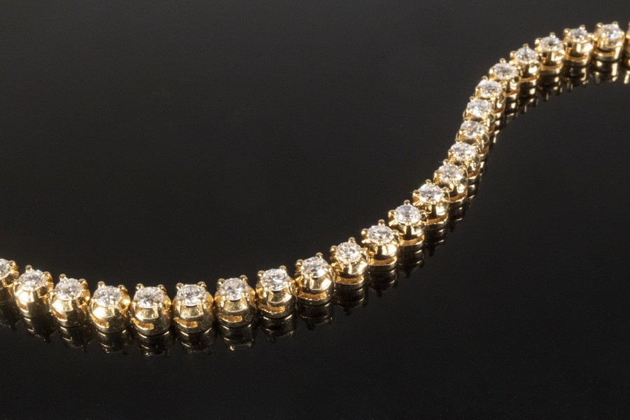 Appraisal: LADIES DIAMOND TENNIS BRACELET K Yellow Gold diamond tennis bracelet