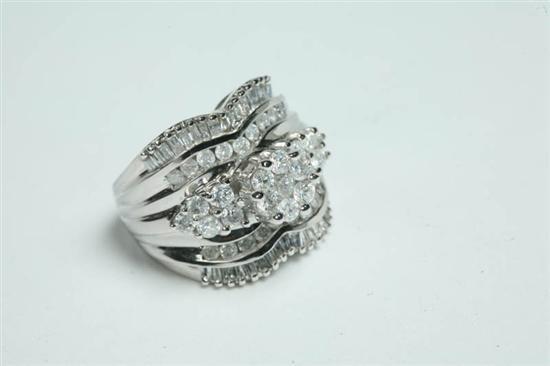 Appraisal: DIAMOND RING Hallmarked K white gold ring with outer rows