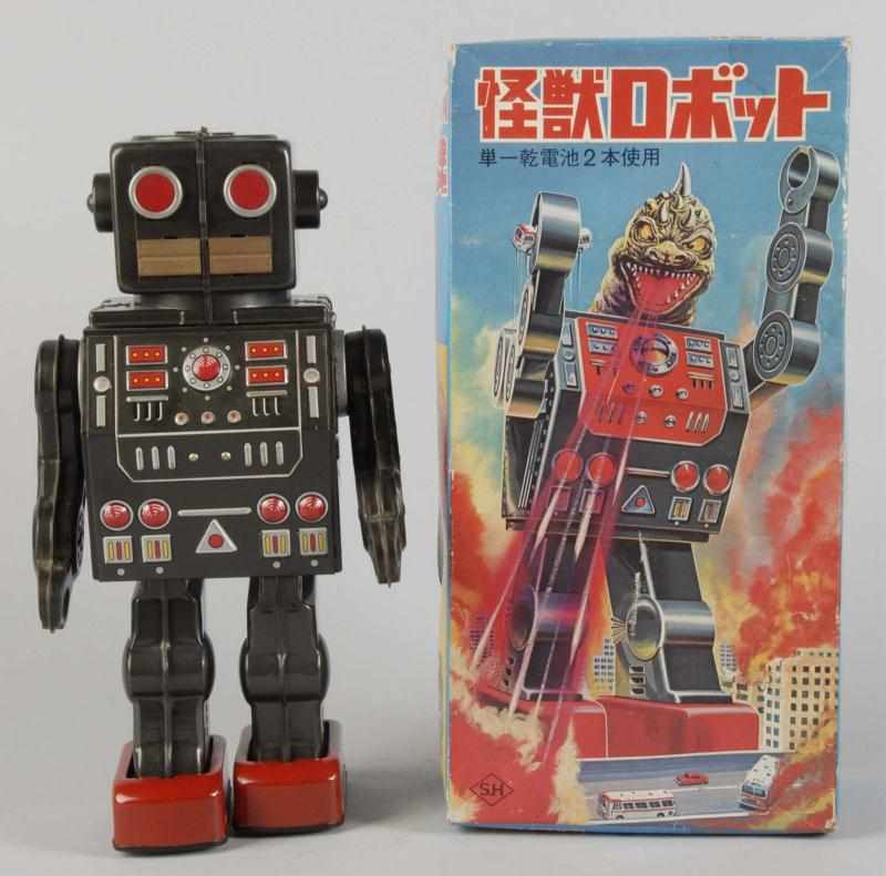 Appraisal: Tin Litho Dino Robot Battery-Operated Toy Description Japanese Working Made