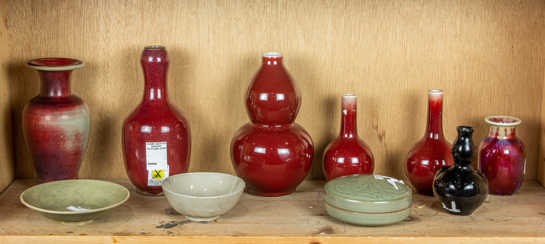 Appraisal: SHELF OF CHINESE MONOCHROME CERAMIC OBJECTS Shelf of Chinese monochrome