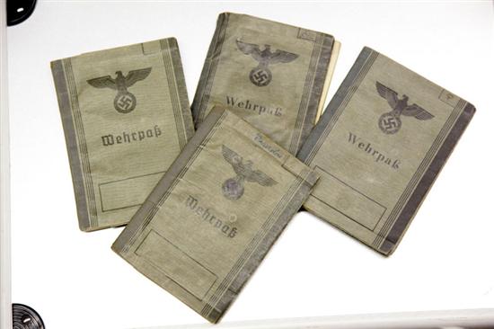 Appraisal: FOUR GERMAN ARMY INFANTRY SOLDIERS PASSPORTS Includes photos and travel