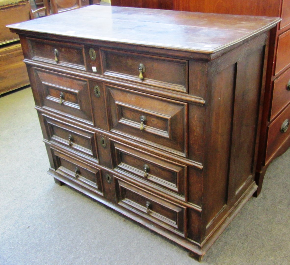 Appraisal: A th century oak chest of four long geometric moulded