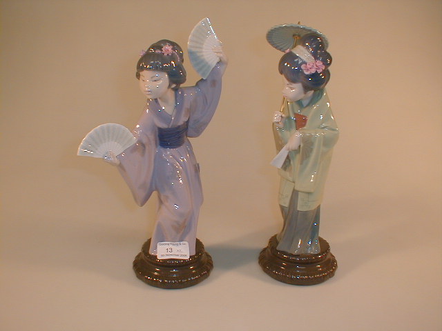 Appraisal: Two Lladro figures of oriental females model nos and