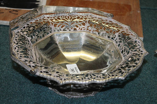 Appraisal: A SILVER BASKET with octagonal pierced border Sheffield cm across