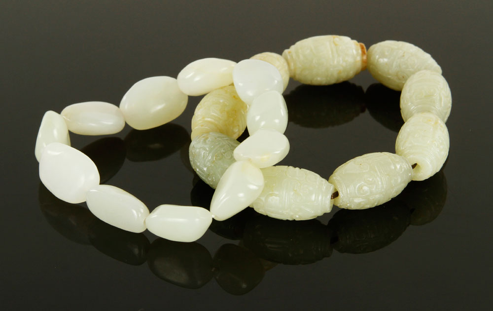 Appraisal: - Chinese White Jade Bracelets Two Chinese white jade bracelets