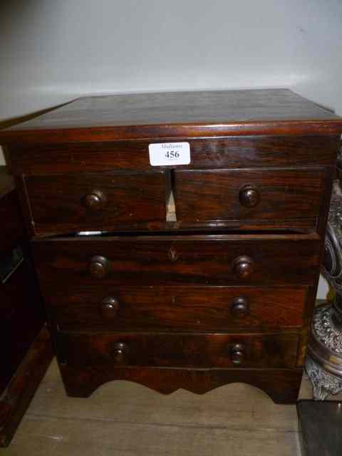 Appraisal: A TH CENTURY ROSEWOOD APPRENTICE CHEST of three long two