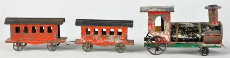 Appraisal: Early Handpainted Tin Floor Train American Includes steam engine stenciled