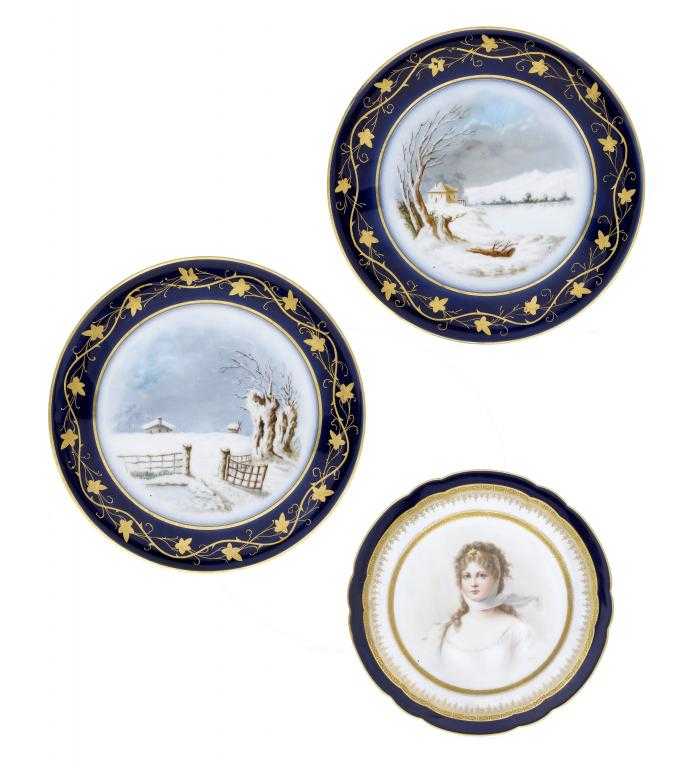 Appraisal: A PAIR OF FRENCH COBALT GROUND DESSERT PLATES painted with