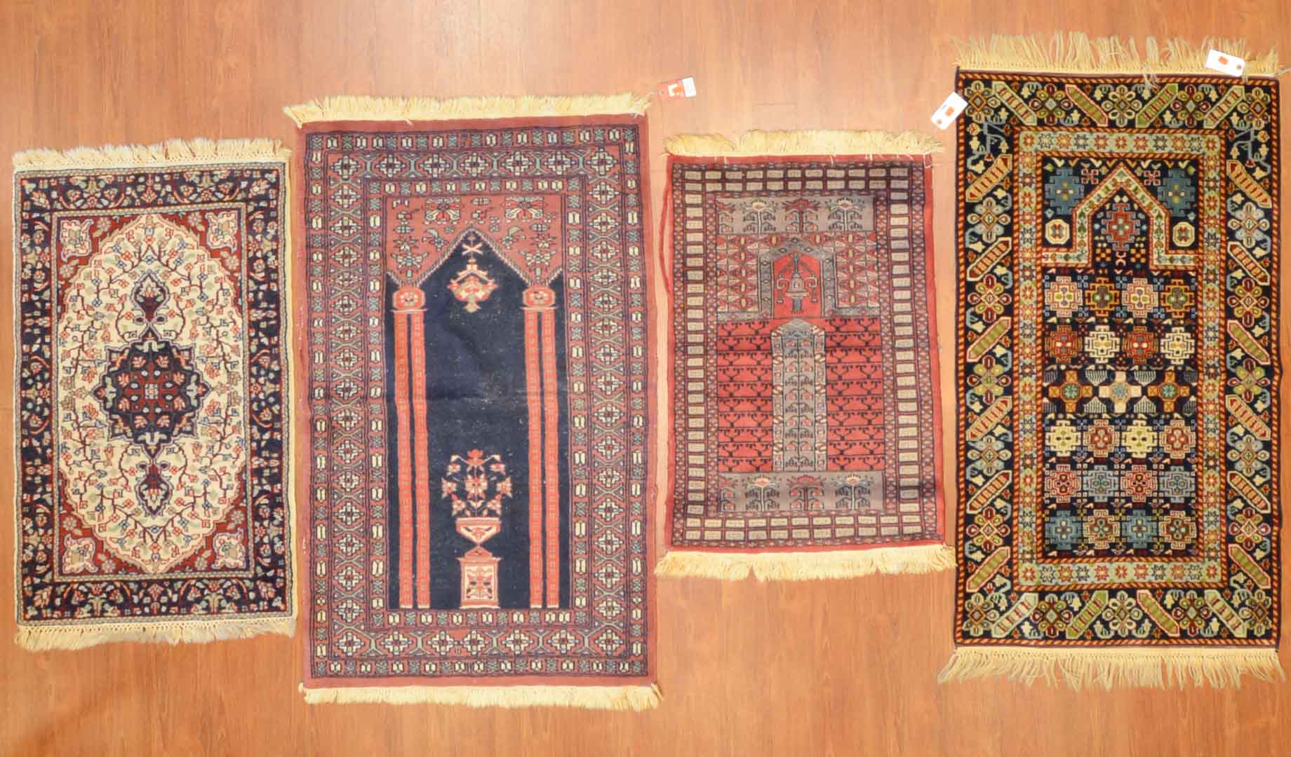 Appraisal: Prayer rug assortment circa Two Pakistani rugs one Turkish rug