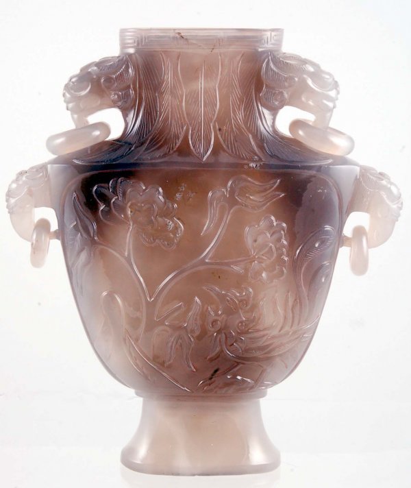 Appraisal: Chinese gray jade vase Flattened urn form with double lion's