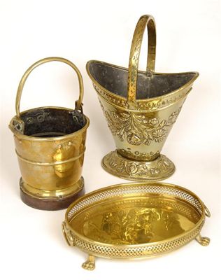 Appraisal: A small brass bucket with swing handle and an engraved