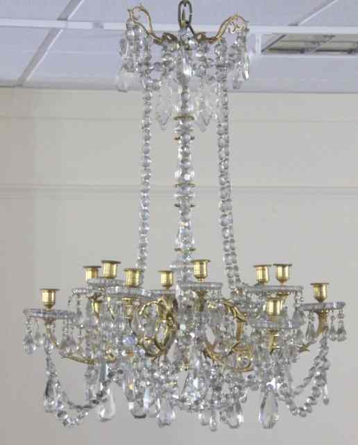 Appraisal: A French twelve-branch twelve light chandelier the scrolling gilt metal