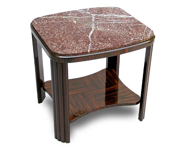 Appraisal: An Art Deco macassar ebony and marble table circa The