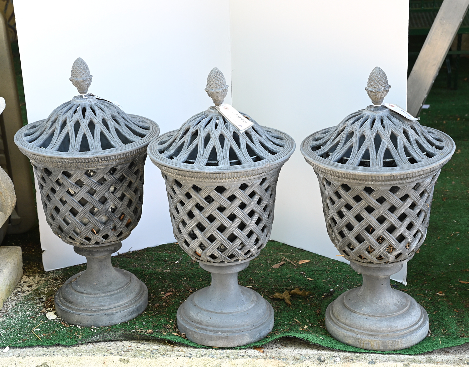 Appraisal: REGENCY STYLE COVERED LEAD GARDEN URNS th c Neo-Classical style