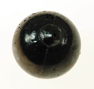 Appraisal: BLACK MOLDED CLAY TARGET BALL - diameter CONDITION Generally good