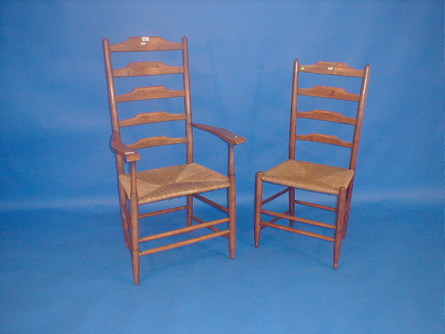 Appraisal: A set of four elm high ladder back chairs including