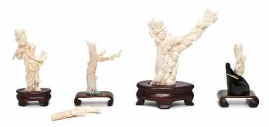 Appraisal: A Collection of Four Chinese White Coral Carvings each depicting