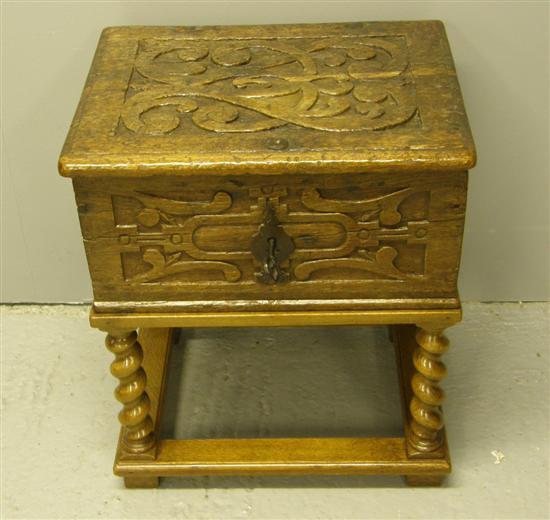 Appraisal: Oak bible box th century with scroll carved decoration on