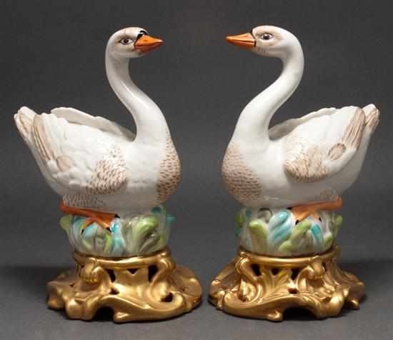 Appraisal: Pair of Mottahedeh Italian porcelain swan figures in the Chinese