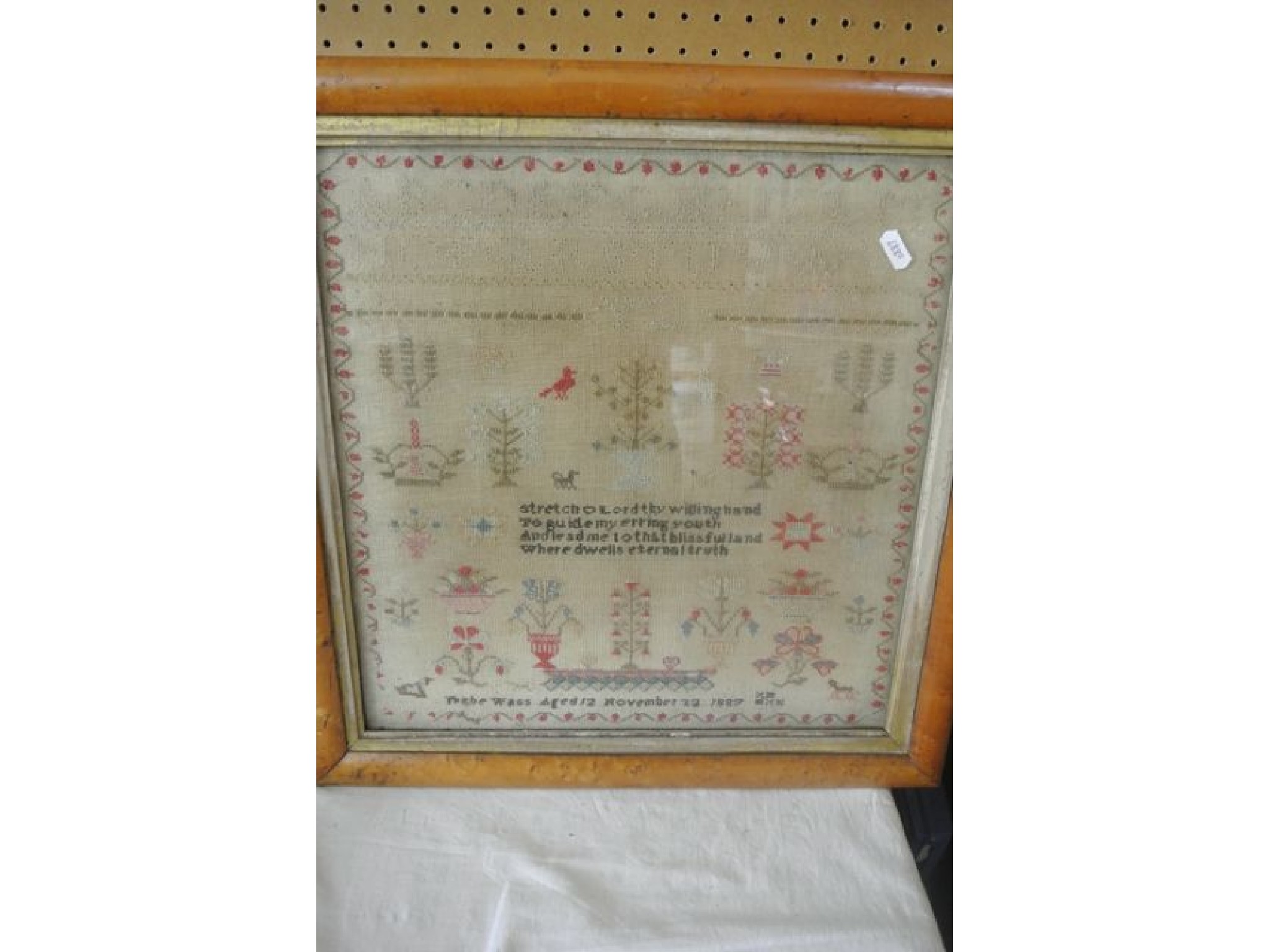 Appraisal: A th century needlework sampler by Phoebe Wass aged November