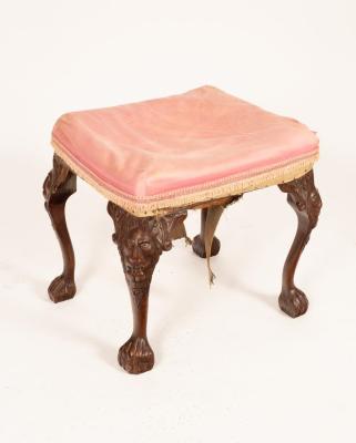 Appraisal: A th Century carved walnut stool on carved legs with