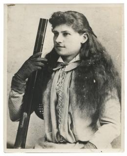 Appraisal: Two Photos and Booklet Related to Annie Oakley Including a