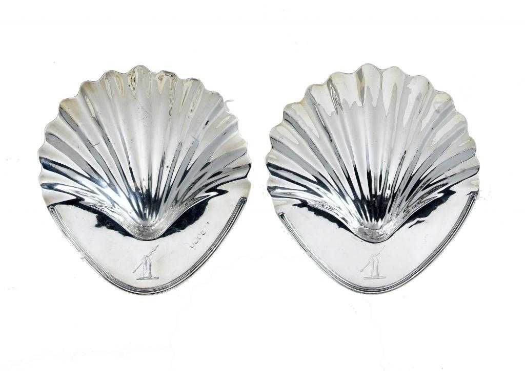 Appraisal: A PAIR OF GEORGE III BUTTER SHELLS with reeded rim