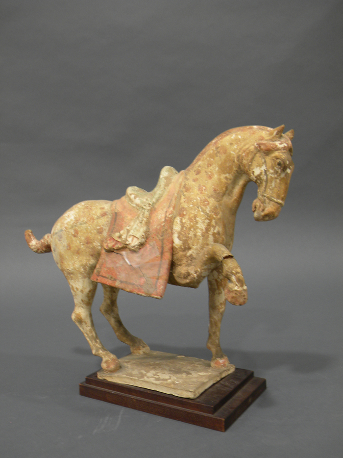 Appraisal: Pottery Horse China probably Tang dynasty a caparisoned horse with