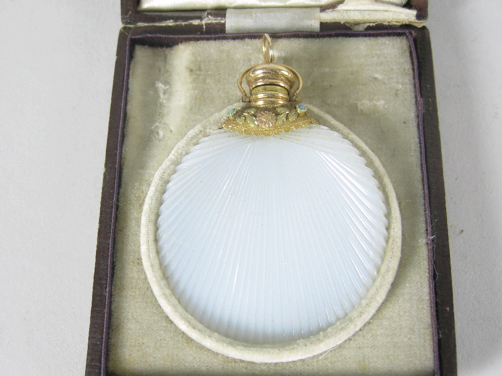 Appraisal: A th Century opalescent milk glass Scent Bottle of fluted