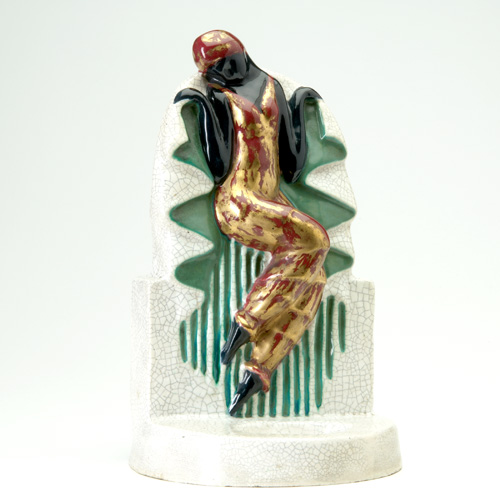 Appraisal: EVOLUTION Small earthenware fountain with a figurine resembling Josephine Baker