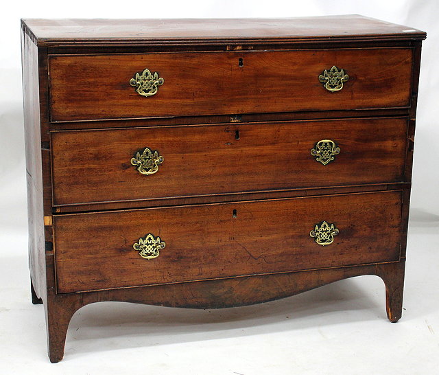 Appraisal: A TH CENTURY MAHOGANY CHEST OF THREE LONG DRAWERS each