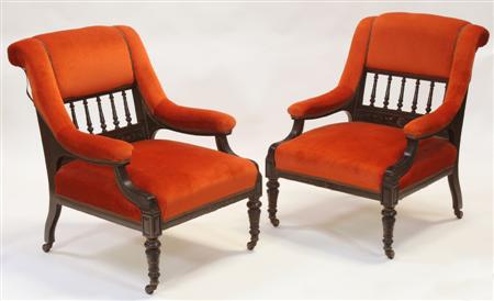 Appraisal: A pair of Victorian Aesthetic ebonised chairs the scrolled orange