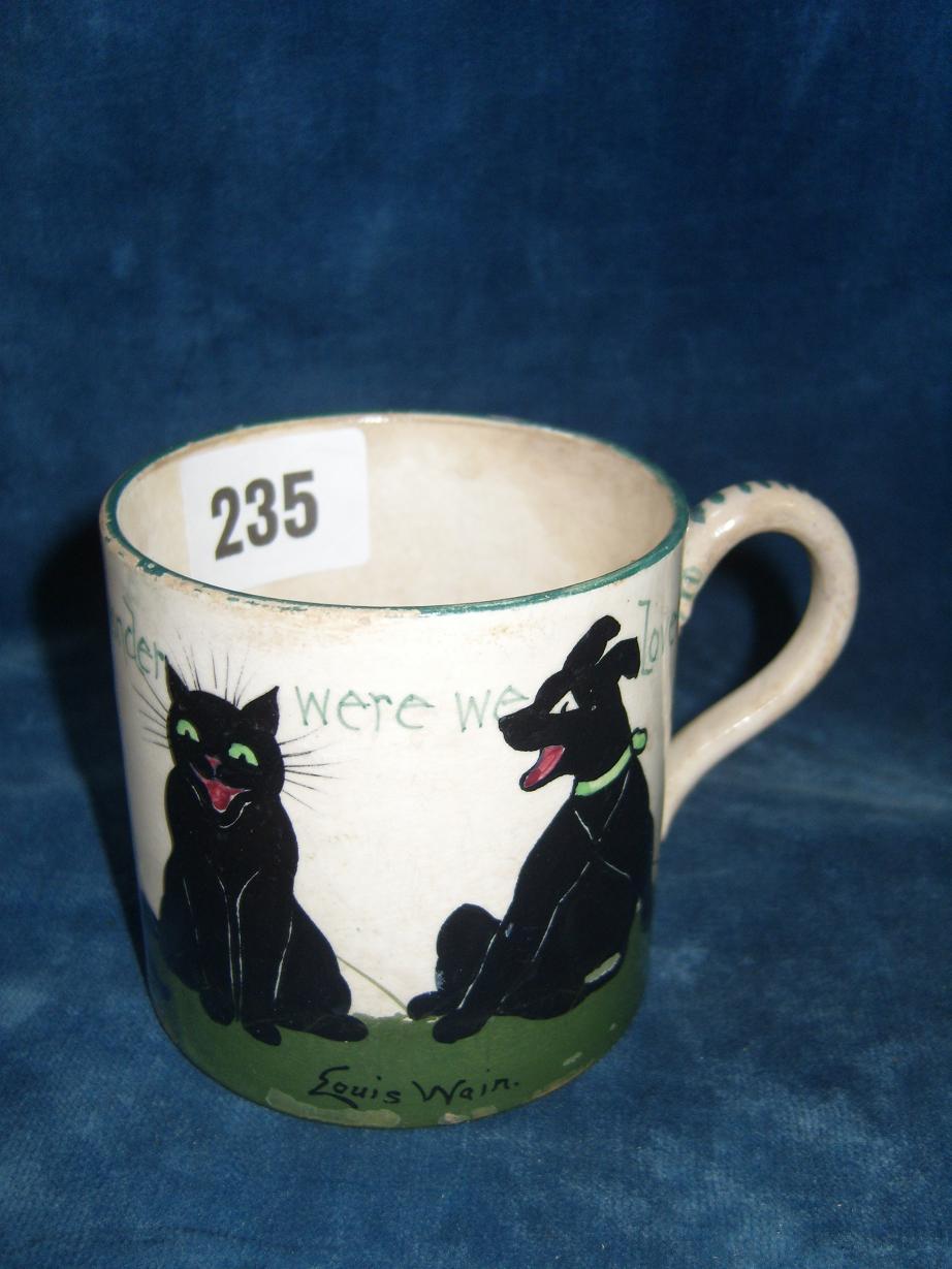 Appraisal: An early th century mug with painted humorous decoration showing