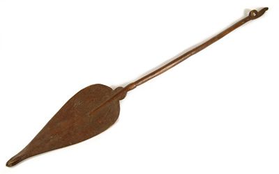 Appraisal: A ceremonial wood paddle with a tear drop blade part