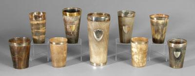 Appraisal: Nine horn cups one with engraved scene of lovers in