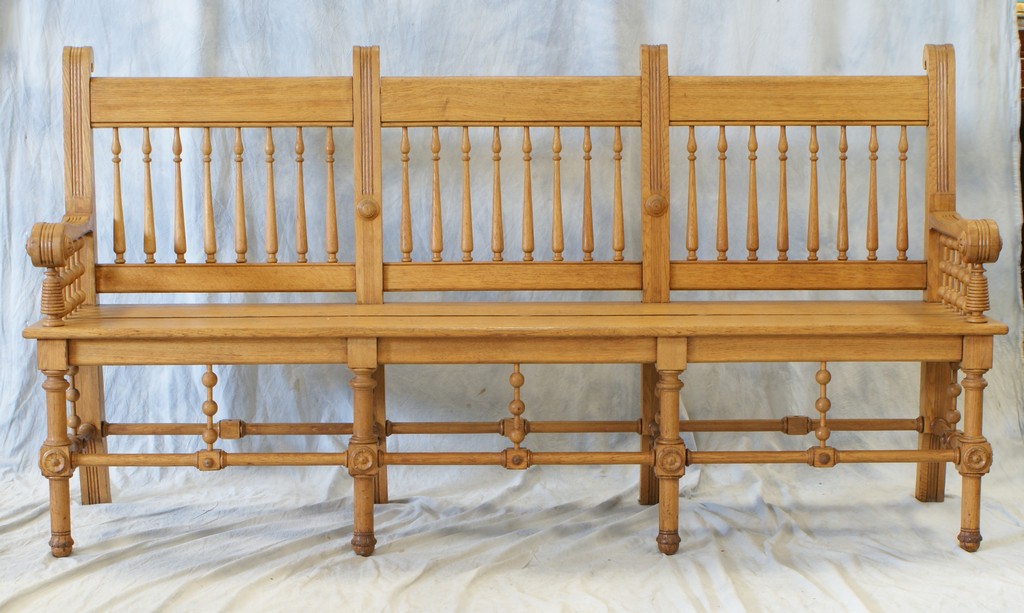 Appraisal: Victorian oak spindle back settee stick and ball detail l