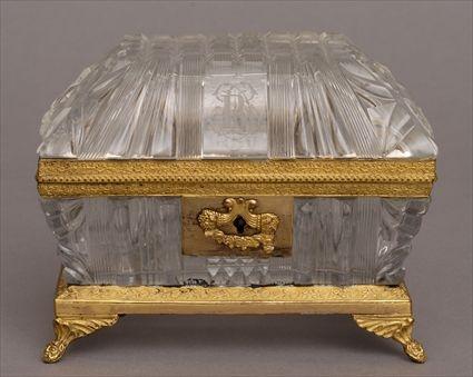 Appraisal: FRENCH GILT-METAL MOUNTED CUT-GLASS COFFRET The chamfered lid with engraved